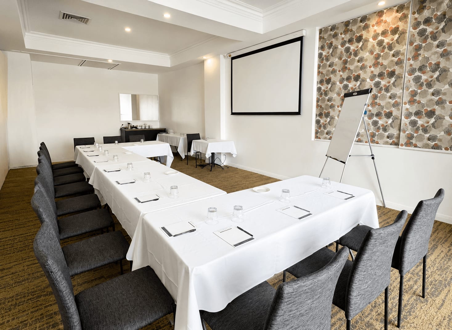 Meeting room set in U-shape at Burnett Riverside Hotel